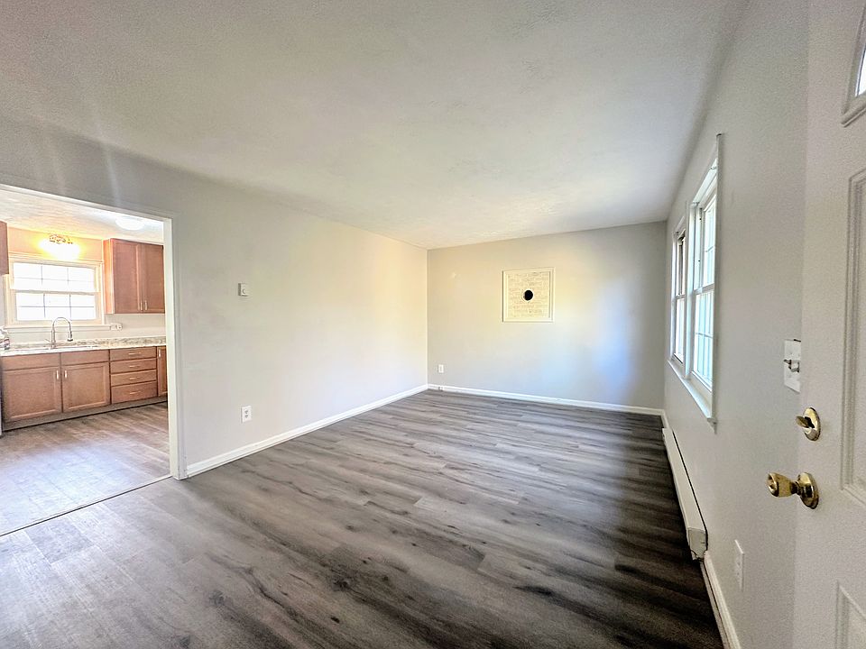 Family Room - freshly painted and new laminate flooring.