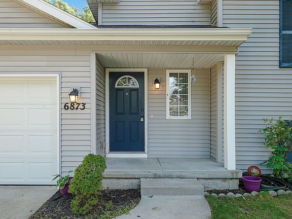 3rd image of 6873 Whispering Forest Dr NE