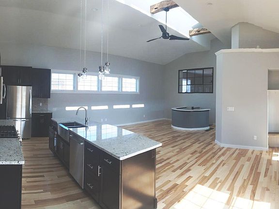 Dramatic open floor plan with granite counters and lots of light