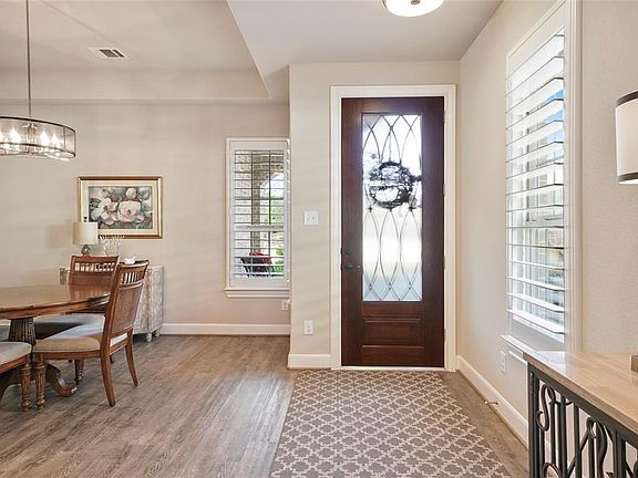This charming home greets you with an open concept floor plan.