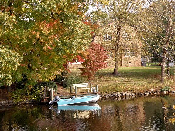 Rear view of dock and house from pond