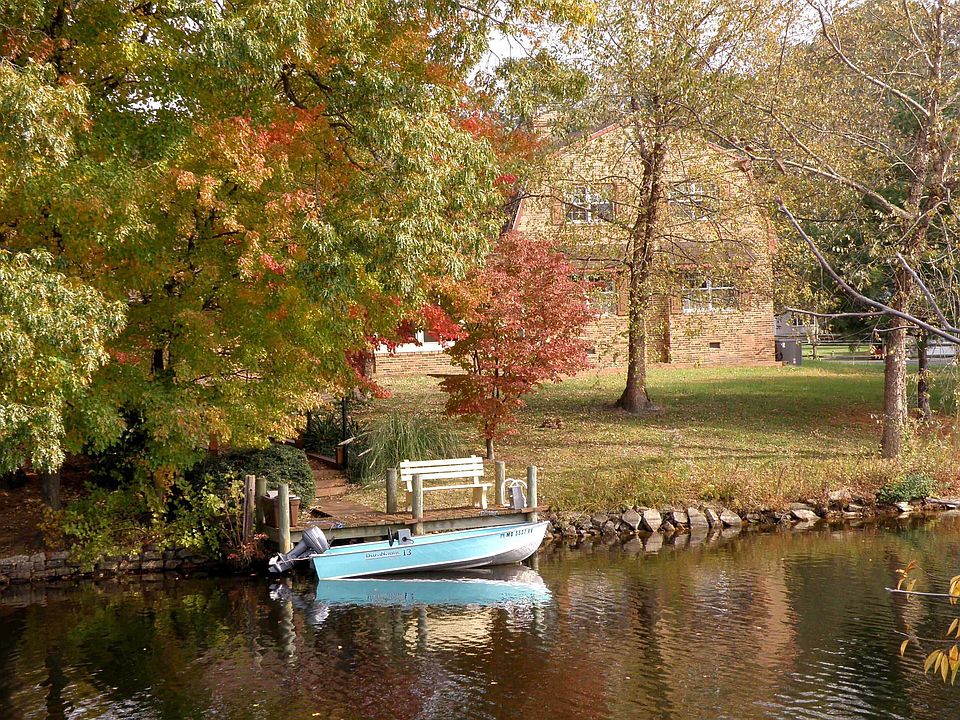 Rear view of dock and house from pond