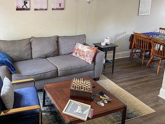 Living Room is spacious and flows into the dining/kitchen. (unit will be unfurnished.