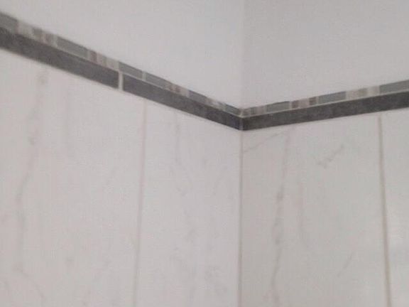 Ceramic tile shower over tub