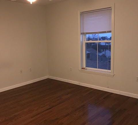 Bedroom facing the back of the building and the beach