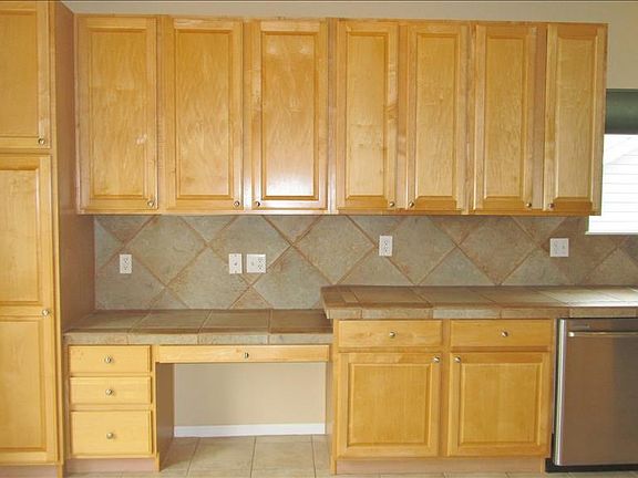 Cabinets, built-in desk and lots of countertop space