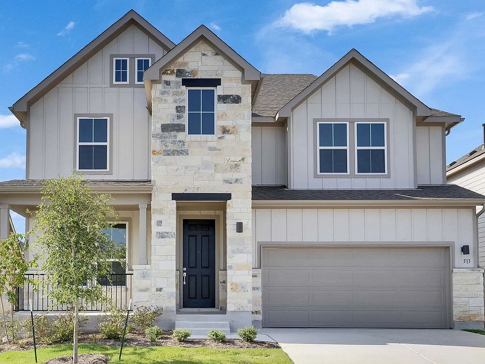 Experience refined living in this Rosewood home, featuring a stunning stone facade and sleek gray si