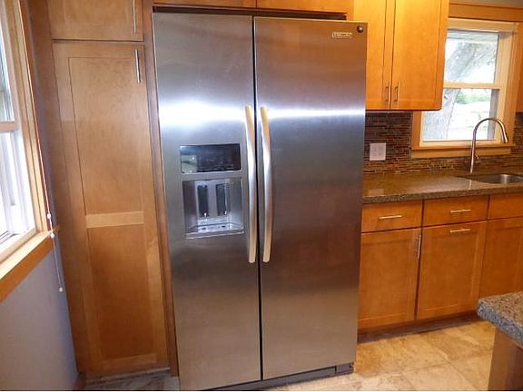 SENSE OF GREATNESS Very roomy refrigerator will store all your needs with water & ice in the door!