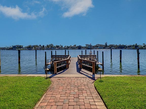 Common dock with fish cleaning table, 2 benches and boat slips