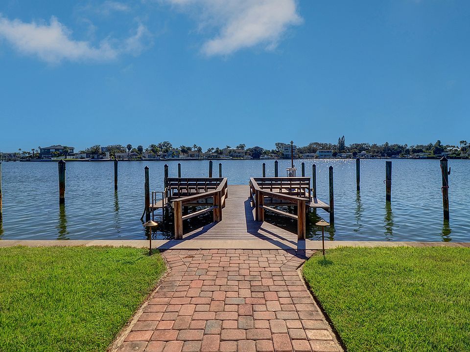 Common dock with fish cleaning table, 2 benches and boat slips