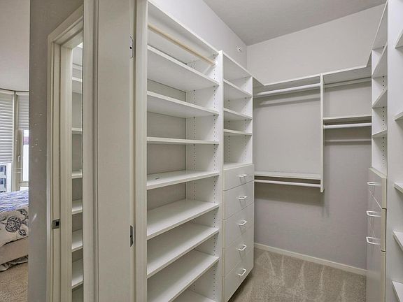 Walk-in closet in the master bedroom.