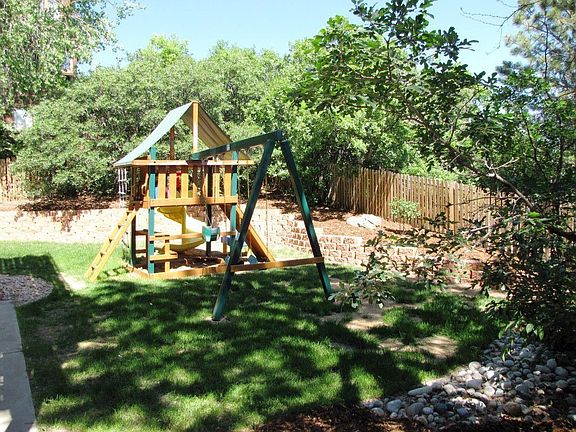 Rear Fenced Yard and Gorilla Playset