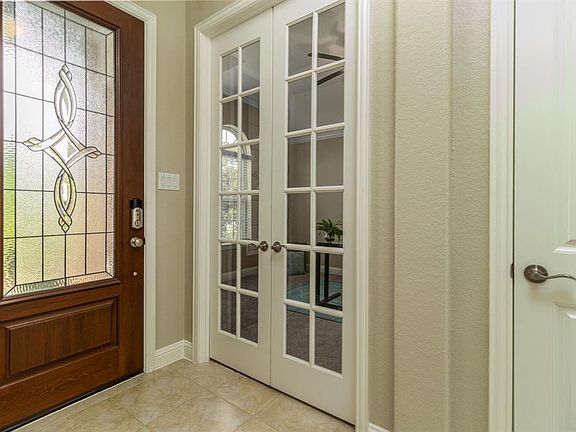 To the left of the entry, behind the stylish french doors is the convenient home study.