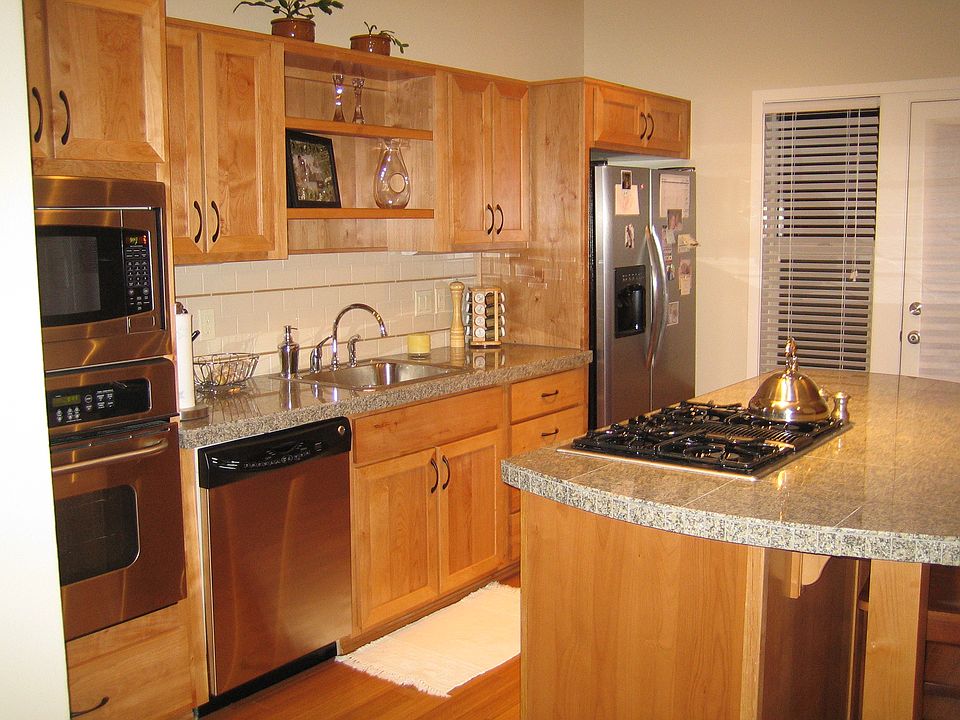 Kitchen with gas stove and stainless steel appliances