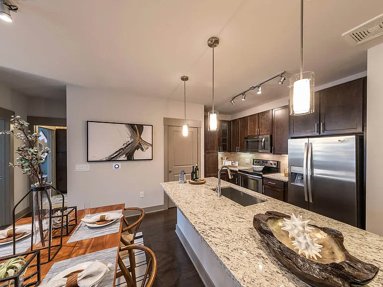 Our modern kitchens are designed with the home chef in mind, featuring stainless steel appliances