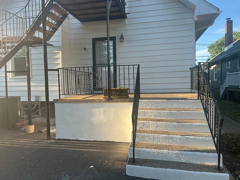 Private back entrance beside driveway
