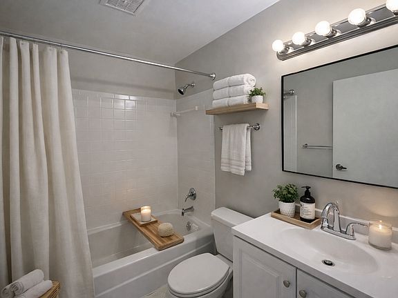 Newly renovated full bathroom w/ bathtub and shower