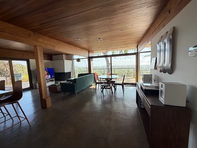 Another wide-angle view highlighting the spacious open floor plan.
