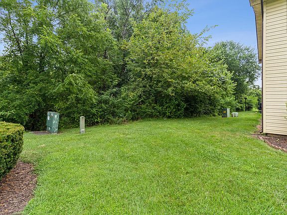 Large green space on left side of house offers lots of privacy!