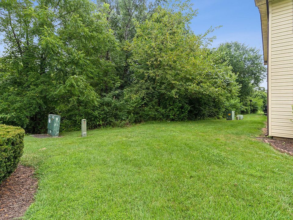 Large green space on left side of house offers lots of privacy!