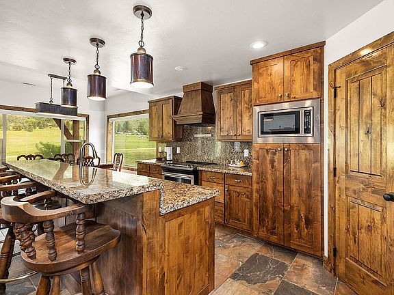 Kitchen with bar stools area