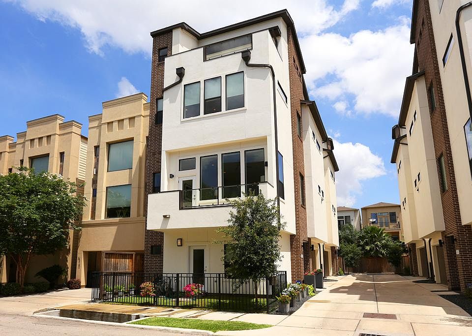 Front view of the contemporary four story home