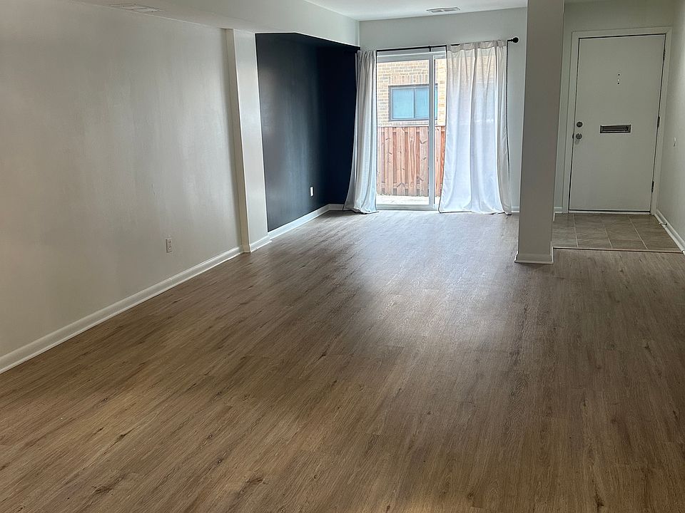 "Bright, open living area with natural light_perfect for relaxing or working from home."