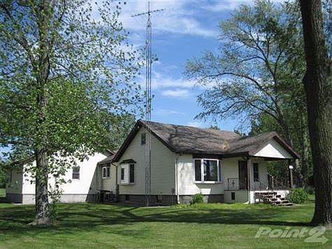 Property has several mature trees.