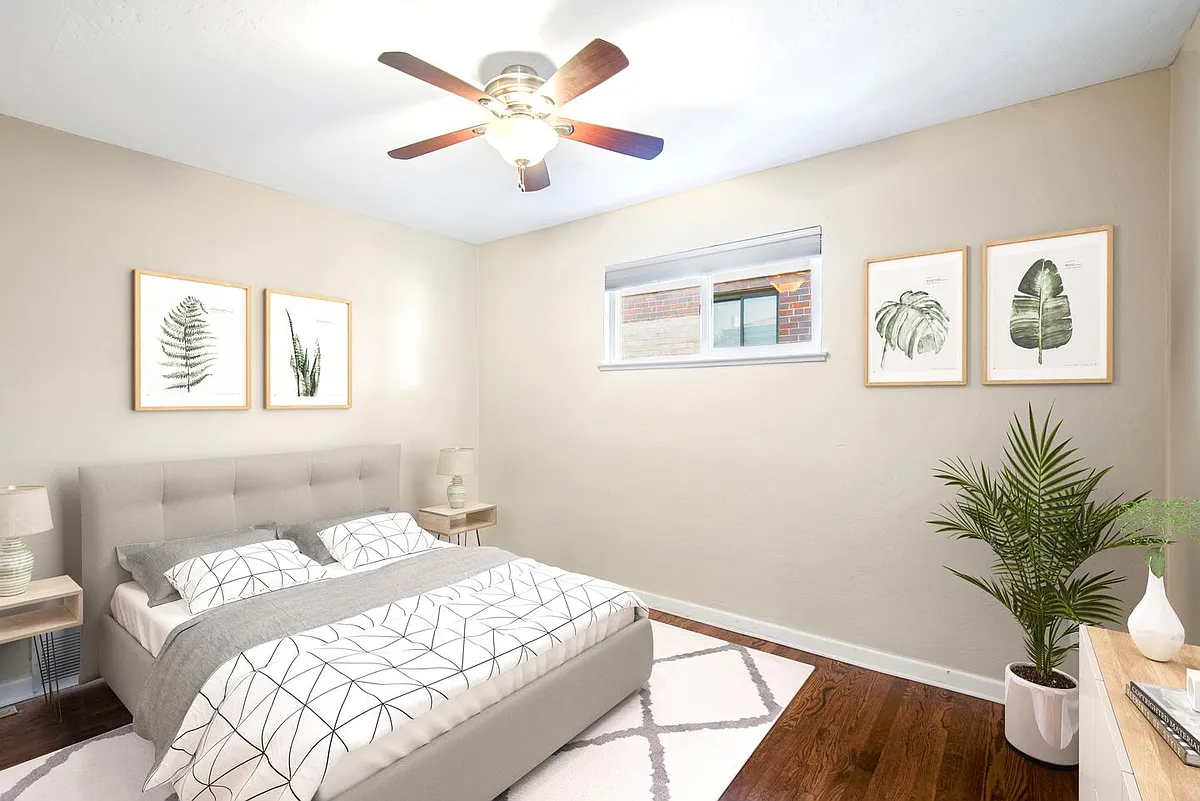 Bedroom 1. This image shows a virtually furnished space. Bedrooms come unfurnished. - 2605 N Milwaukee St