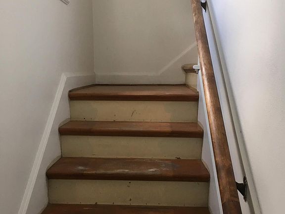 Entrance. Note: Pic was taken before we painted/stained the steps and put carpet strips on each step.