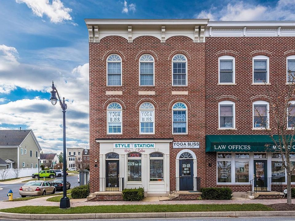 Front of building, third unit, top floor