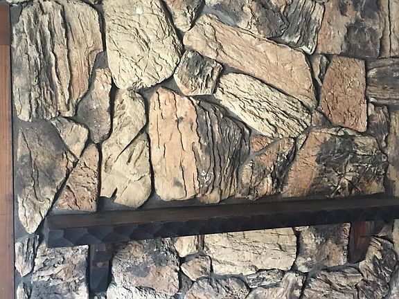 Mantel with lava stones