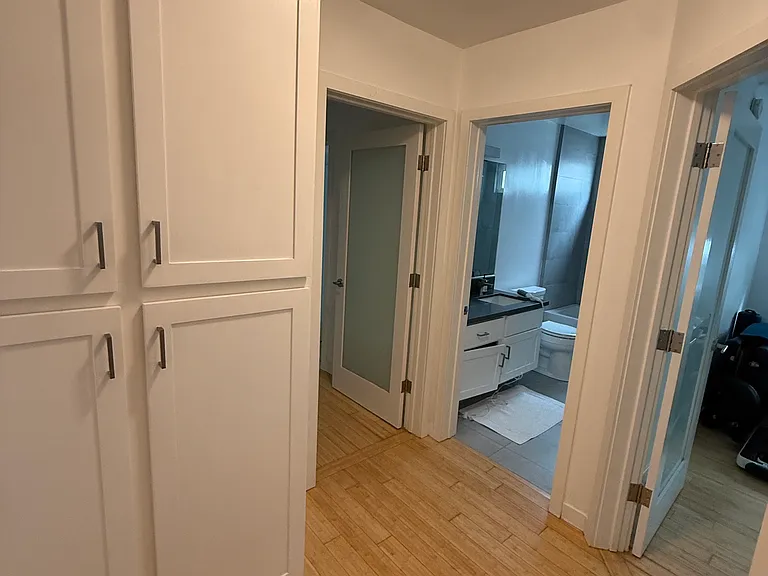 Hallways to access bathroom and bedrooms and linen closet