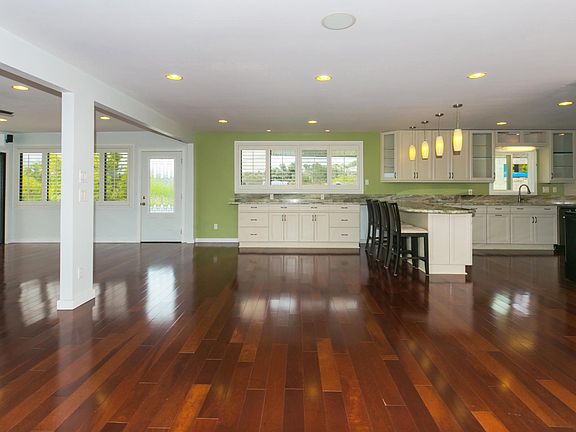 Enough room for formal dining table or bar top dining.