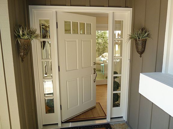 Front door, atrium in rear