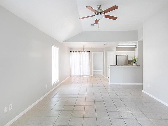 Open living and dining area. No carpet = easy upkeep.