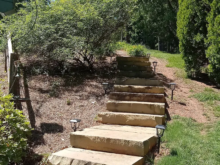 stone steps to mailboxes