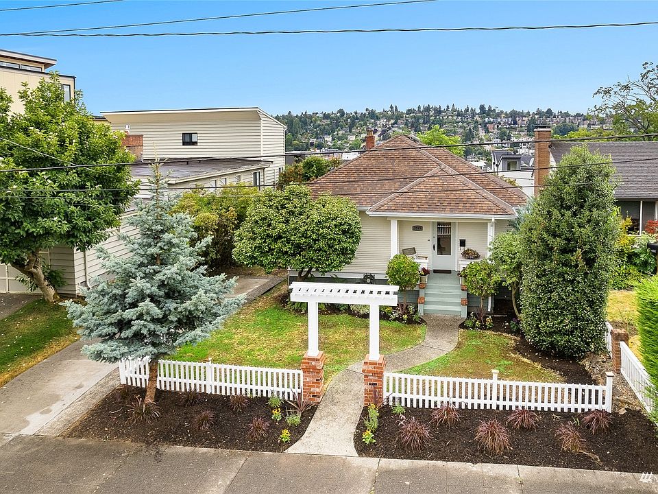 Charming Queen Anne craftsman cottage with curb appeal that all on its own says, "Pick me"!