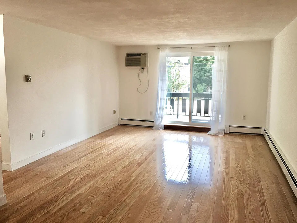 Living area empty after install of new hardwood floors