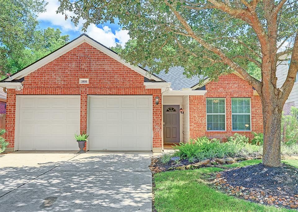 Beautiful 3/2/2 with gorgeous decorator touches throughout; wood laminate floors, soft neutral paint, raised ceilings with recessed lights, updated fixtures & pulls, stainless steel appliances, and a gas wood-burning fireplace. Enjoy the large fenced