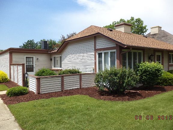 Enjoy 2- patios/1-car garage