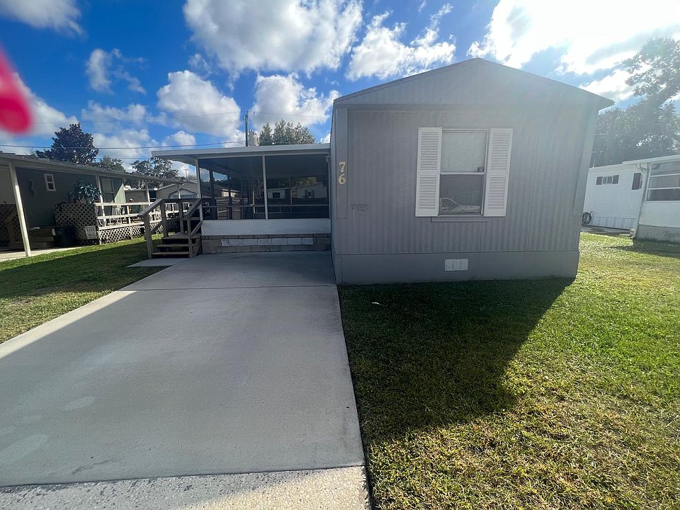 76 Golden Gate, NOT in a mobile home park, In a area of all mobile homes. Across from Silver Sands Middle School Port Orange
