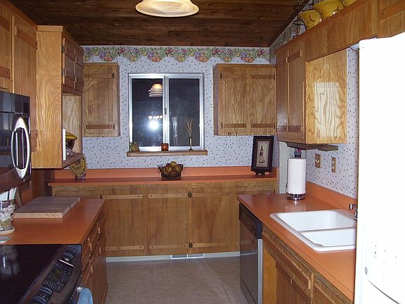 Kitchen area has plenty of storage and breakfast area