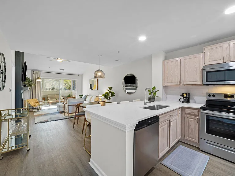 Quartz countertops and luxury vinyl plank floors.