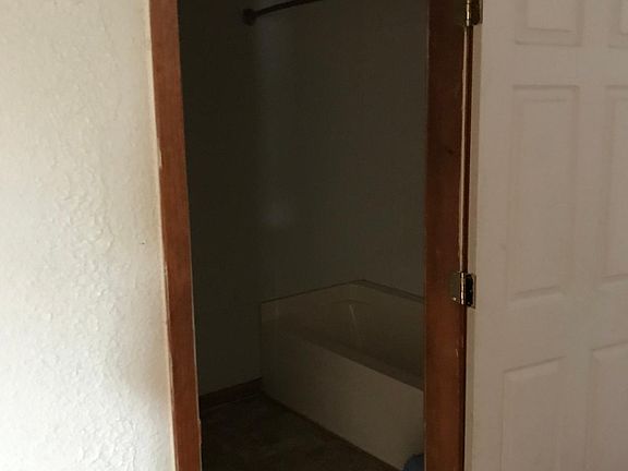 Bathroom is through the bedroom creating a master suite