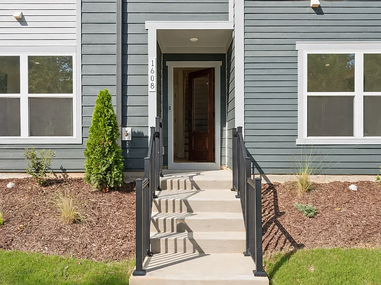 Private front entrance with landscaped walkway