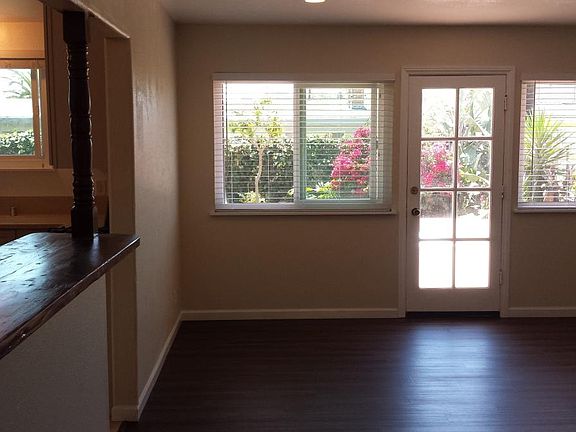 Portion of Living room, & Rear Yard View