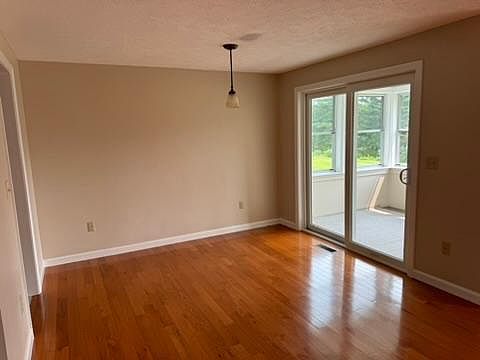 Main Floor Dining Room with 3 season porch