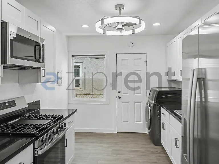 10907 S Burl Ave — Photo 6