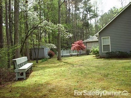 backside of house view/ bench
